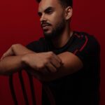 man, portrait, sitting on a chair, studio, brazilian man, young man, studio portrait, studio photography, brazilian man, brazilian man, brazilian man, brazilian man, brazilian man